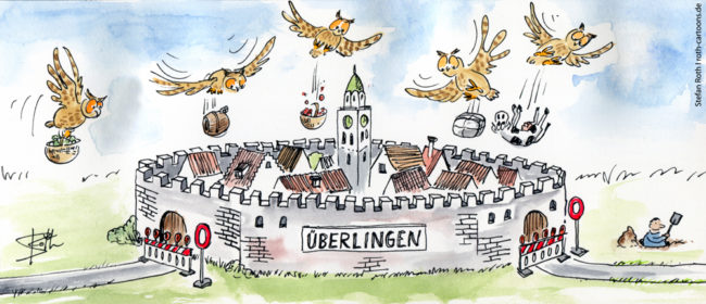 Cartoon-Karikatur-Comic---Überlingen wurde zur verkehrslosen Festung mit Mauer umgebaut und wird nur noch über die Luftbrücke mit Uhus versorgt.